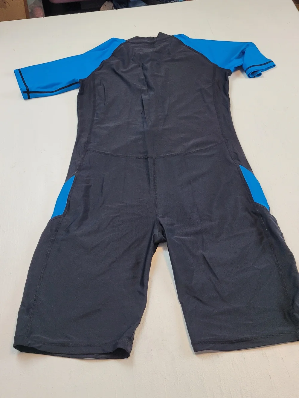 Black and Bright Blue Short Sleeve Swim Suit with Front Zip